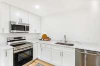New appliances, quartz countertops, corner lazy susan, deep basin sink