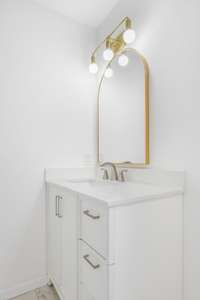 hallway full bath with linen closet. Tub/shower combo and tile flooring