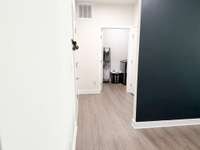 To the left of the front door entrance you will find the garage access, 2 storage closets, and walk in laundry room
