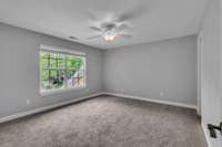 13x14 secondary bedroom with walk in closet and new carpet