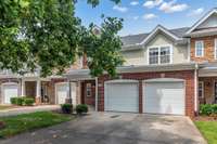 Large 2 bay garage and additional parking in driveway.
