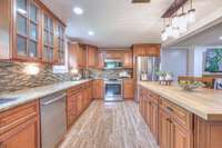A large island provides ample space for seating and meal preparation.