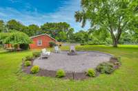 A  large fire pit is ideal for entertaining guests.