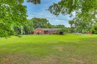 Here’s another view of the yard. Bring the chickens and all the pets!