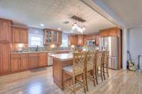 Beautiful custom cabinetry with stainless steel appliances