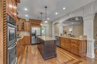 Use these double ovens to prepare meals for you, your family, or your guests. Pay close attention to the hardwood floors with borders.