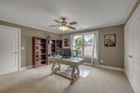 This second-floor bedroom is being used as an office; what a great idea!
