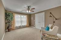 One of three second-floor bedrooms with lots of natural light.