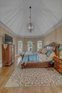 Another view of the custom, transcendent ceiling in the First-Floor Primary Bedroom.