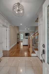 A view from the foyer into the family room.