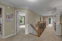 A grand view of the second-floor hallway.