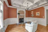You will love this coffered ceiling with magnificent trim work. A versatile room, hearth room, den, hobby room, reading room, or a special place for guests.