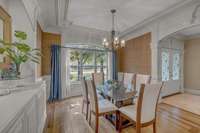 A captivating formal dining room with built-ins and inlay.