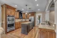 A spacious kitchen with all stainless steel appliances and custom cabinets. The heart of the house!