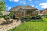The back offers professional landscaping, a fire pit, a patio, a covered deck, and lush grass. Yes, these could be your favorite places this summer and fall!