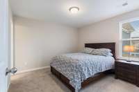 Possible second primary suite bedroom upstairs- large closet and full bathroom attached.
