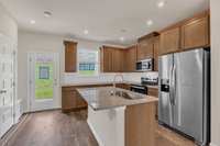 Beautiful Quill colored cabinets and Granite Countertops!