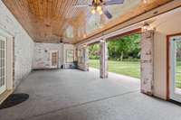 Basement covered porch with motorized screens  - walk out to backyard