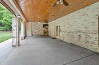 Basement covered porch with motorized screens  - walk out to backyard