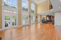 Great Room looking to kitchen and family room