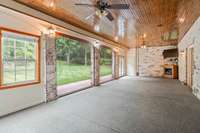 Basement covered porch with motorized screens  - walk out to backyard