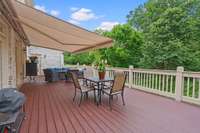 Porch off main floor great room with retractable awning