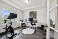 Downstairs Office Space with detailed ceiling.