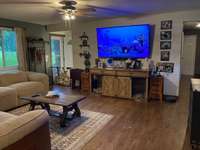 Front door is off-set from living room.