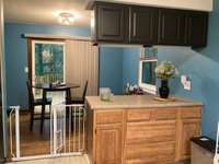 Perfect countertop placement between kitchen and dining room makes for a perfect buffet style meal service!