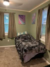Office conveniently located on main level near living room.