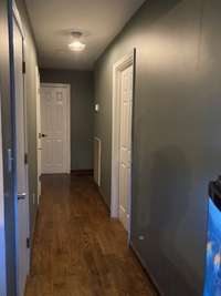 Hallway leads to office, 2 of the 3 bedrooms, full guest bath.  TWO closets (on left) also located in hallway.
