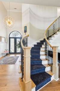 Curved Staircase Makes a statement! WOW!
