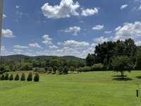 Rare Large private backyard backing up to deeded green space with amazing views of the Tennessee hills