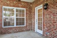 Adorable 11 x 11 screened in porch for privacy and the best part - no bugs!  Enjoy the outdoors while having privacy and a cool breeze  Imagine all your potted plants living and thriving in this outdoor space.