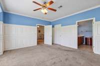 Primary bedroom - ensuite and view into the living area