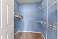 Primary walk in closet.