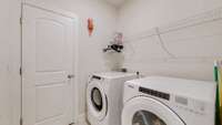 Spacious master suite with a full bath, walk-in closet, and convenient direct access to the laundry room.