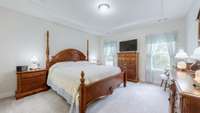 Spacious master suite with a full bath, walk-in closet, and convenient direct access to the laundry room.