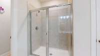 Spacious master suite with a full bath, walk-in closet, and convenient direct access to the laundry room.