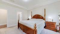 Spacious master suite with a full bath, walk-in closet, and convenient direct access to the laundry room.