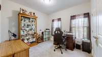 Comfortable 2nd bedroom with great natural light—perfect as a guest room or home office.