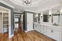 Owner's Bathroom with Refinished Hardwood Floors, New Lighting Fixtures and Fresh Paint.