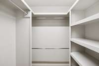 Walkin Closet with Wooded shelves and Extra Storage Space.
