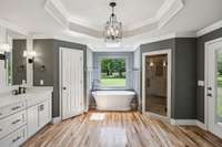 Owner's Suite has Trey Ceiling and New Soaking Tub to relax and unwind.