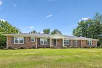 Exterior of House has been updated with New Roof, Front Door, Shutters, Front Columns and Sidewalk.