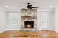 Impressive Stone Fireplace with Gas Logs.