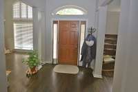 Step inside to the spacious foyer and settle in.