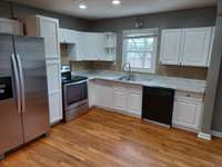 Renovated kitchen with new appliances and new paint