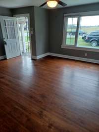 Nice living room with new paint and hardwood floors