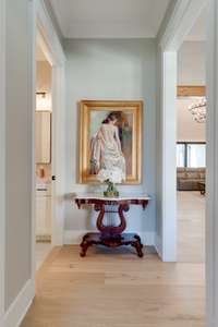 Elegant guest entry hall provides privacy for guests.